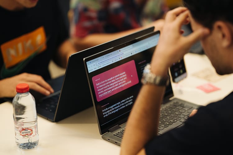 A laptop showing the “Get City Problems to the Right People” challenge