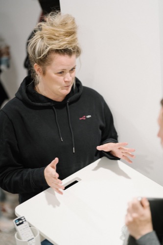 An n8n event attendee explaining an idea